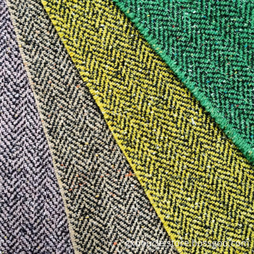 Woolen boucle herringbone with lurex fabric